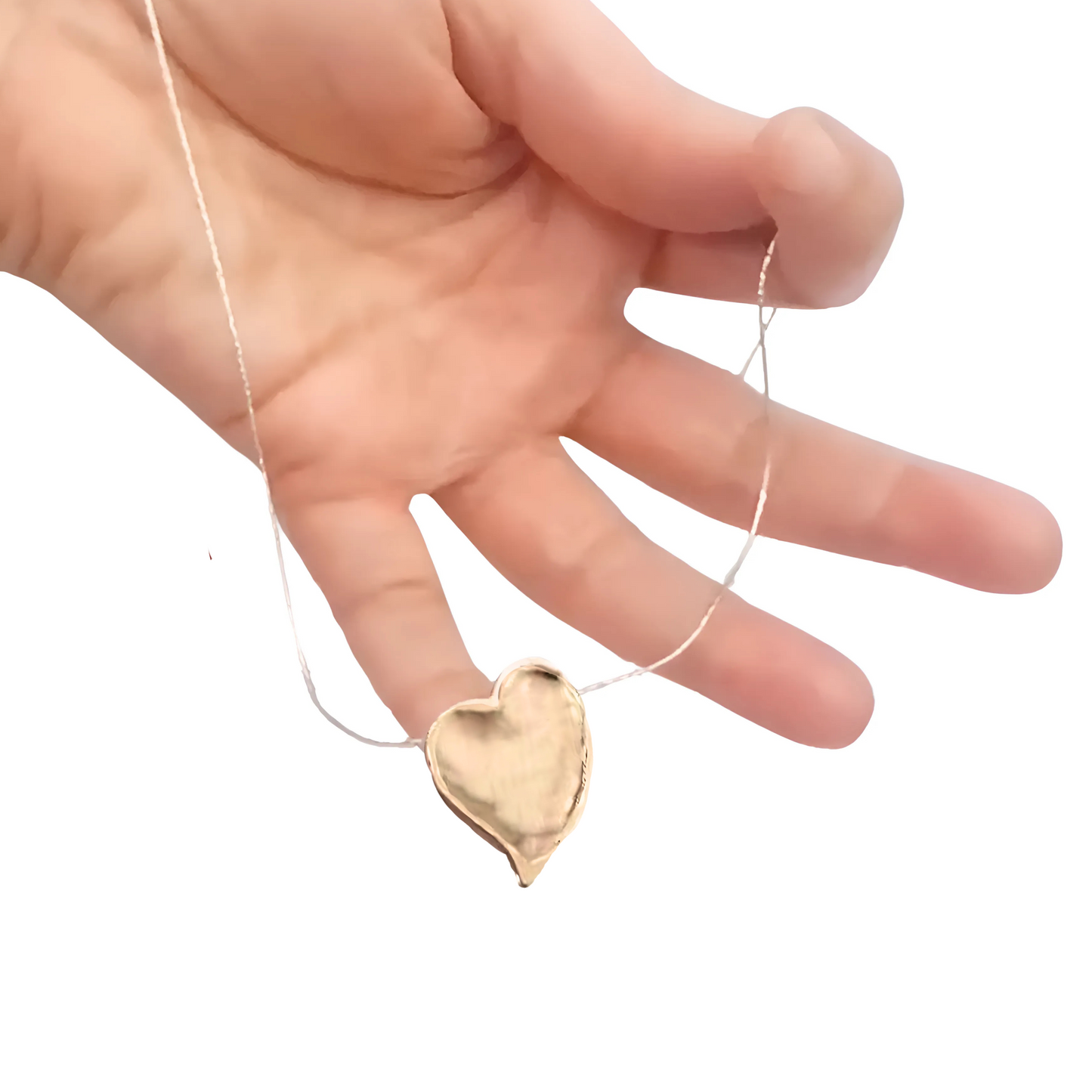 Elegant heart pendant in 9k yellow gold with a polished finish, hanging from a delicate silver chain. This charming pendant is a perfect gift for her, ideal for Christmas, Valentineās Day, or any special occasion, expressing love and sophistication