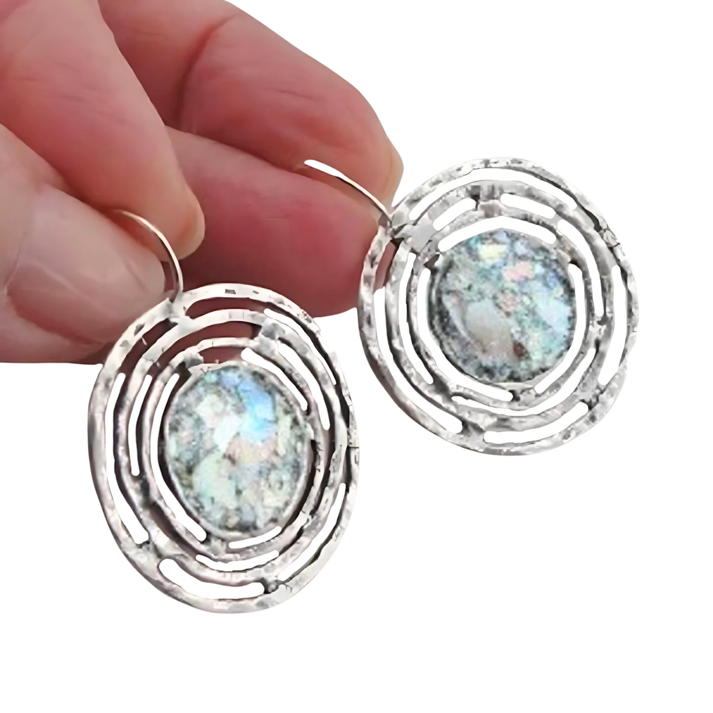 Handmade sterling silver earrings featuring ancient Roman glass with a unique, spiral-inspired design. These one-of-a-kind earrings showcase 2000-year-old glass, adding historical charm and sophistication to any look