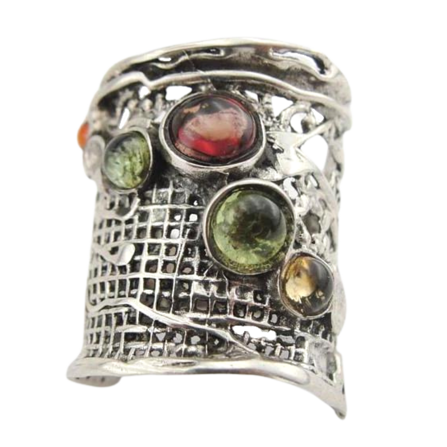 handcrafted sterling silver ring from the 'Nets' collection, featuring a wide silver band with intricate net detailing and six natural gemstones, including tourmaline, garnet, and citrine. The ring displays a unique, artistic design with vibrant green, red, and amber gemstones set against an oxidized silver background, creating a bold, textured statement piece