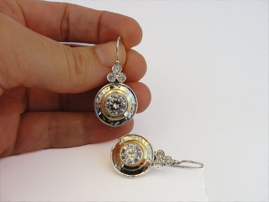 9k yellow gold and sterling silver earrings with sparkling white zircons.