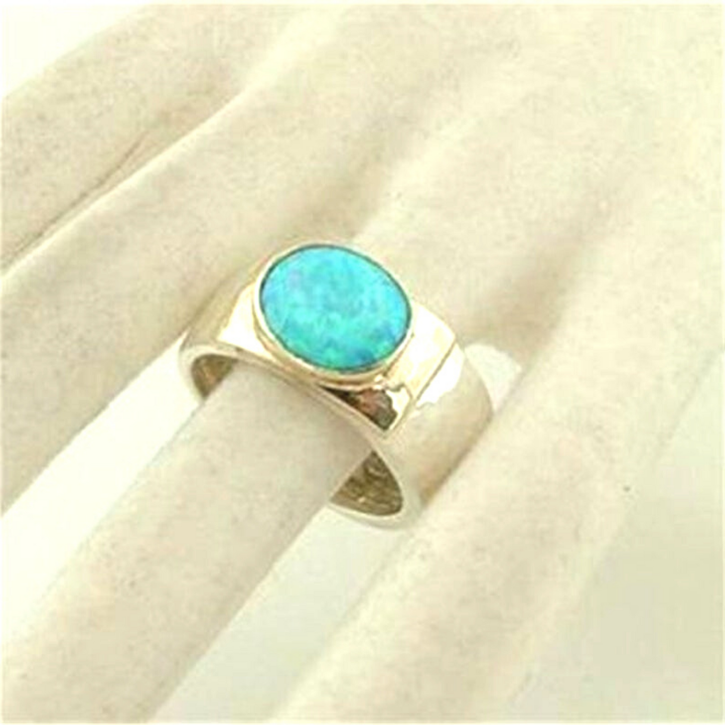 Wide and Solid Sterling Silver Ring Decorated with Yellow Gold and Blue Oval Opal Gemstone
