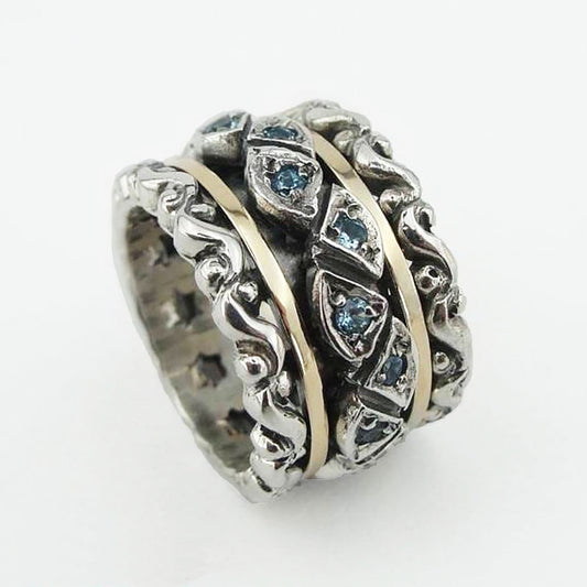 Wide and Chunky swivel Ring , made of Sterling silver, Yellow Gold and blue topaz zircon, ready