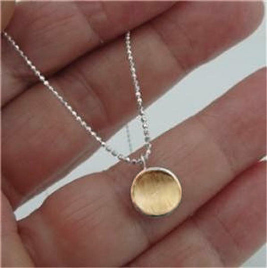 Yellow Gold Brush and Textured on A sterling silver Pendant