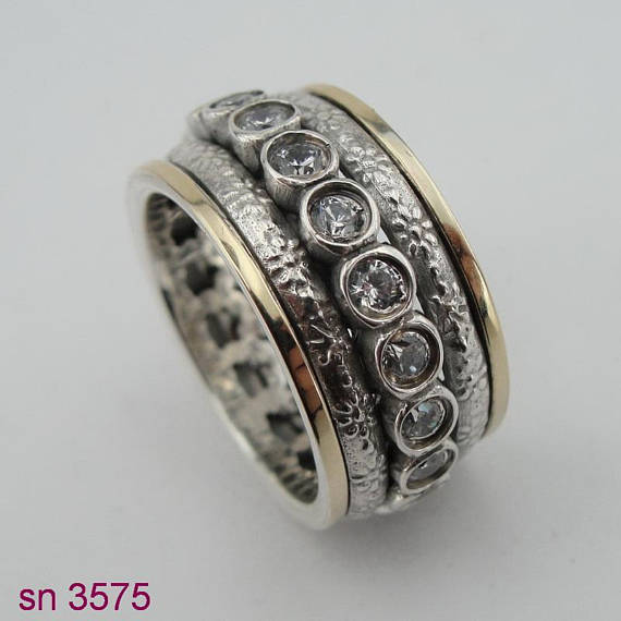 Two Gold & Silver Ring and in Center Studded Zircons Swivel Ring