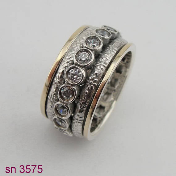 Two Gold & Silver Ring and in Center Studded Zircons Swivel Ring