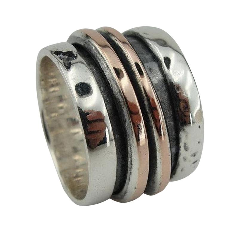 Wide and Swivelling Sterling silver ring, decorated with red gold swivel bands