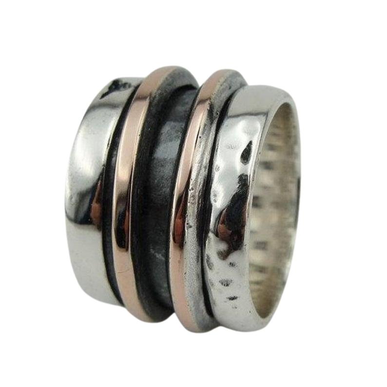 Wide and Swivelling Sterling silver ring, decorated with red gold swivel bands