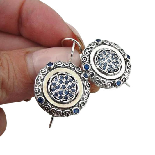 Oriental style silver and gold dangle earrings, decorated with blue Zircon