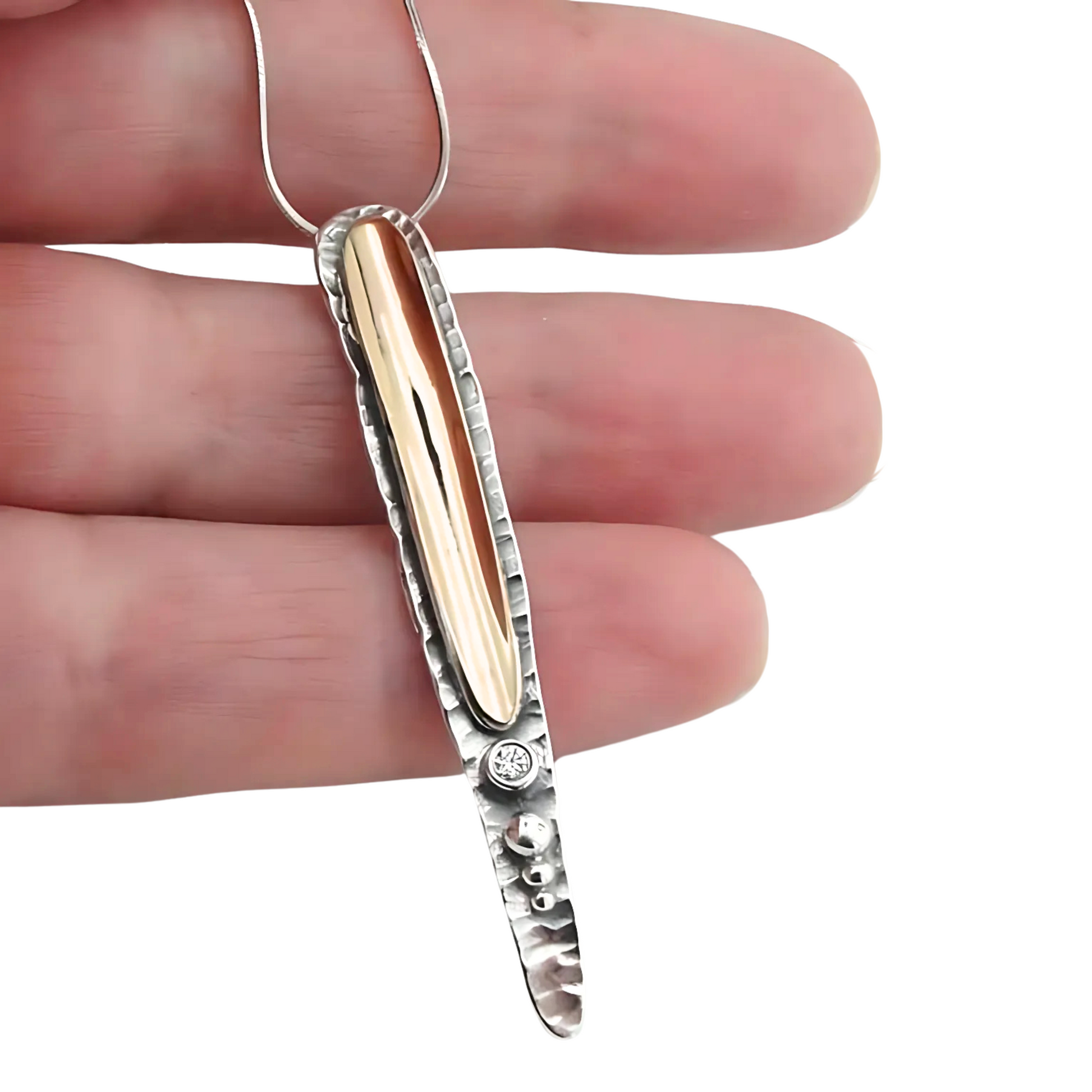 Sterling silver and 9K yellow gold pendant with a clear zircon, modern and elegant design, perfect for a meaningful Christmas gift.