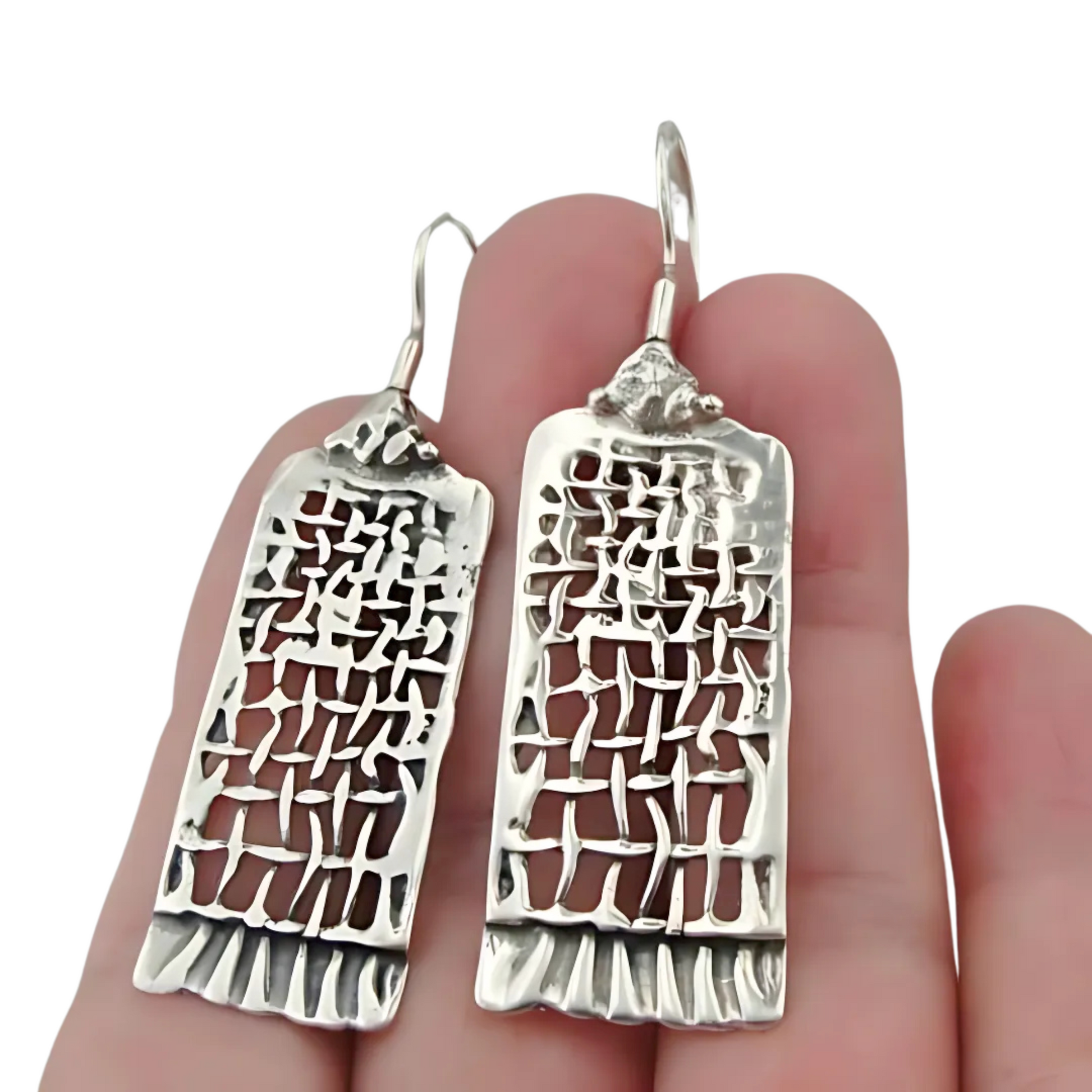 Handmade sterling silver earrings from the "Nets" collection, featuring a unique, contemporary design with intricate detailing. Perfect for a meaningful Christmas gift, combining elegance and craftsmanship. A luxurious accessory for those who appreciate fine jewelry and timeless style.