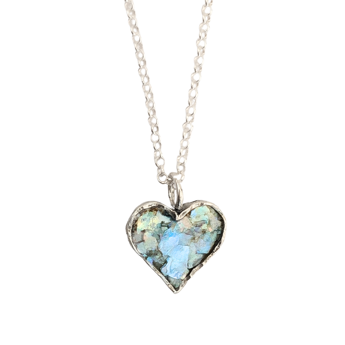 Authentic Roman Glass Heart Pendant in Sterling Silver, featuring a textured silver setting with a heart-shaped inlay of genuine Roman glass. Timeless, handcrafted jewelry, ready to ship for Christmas