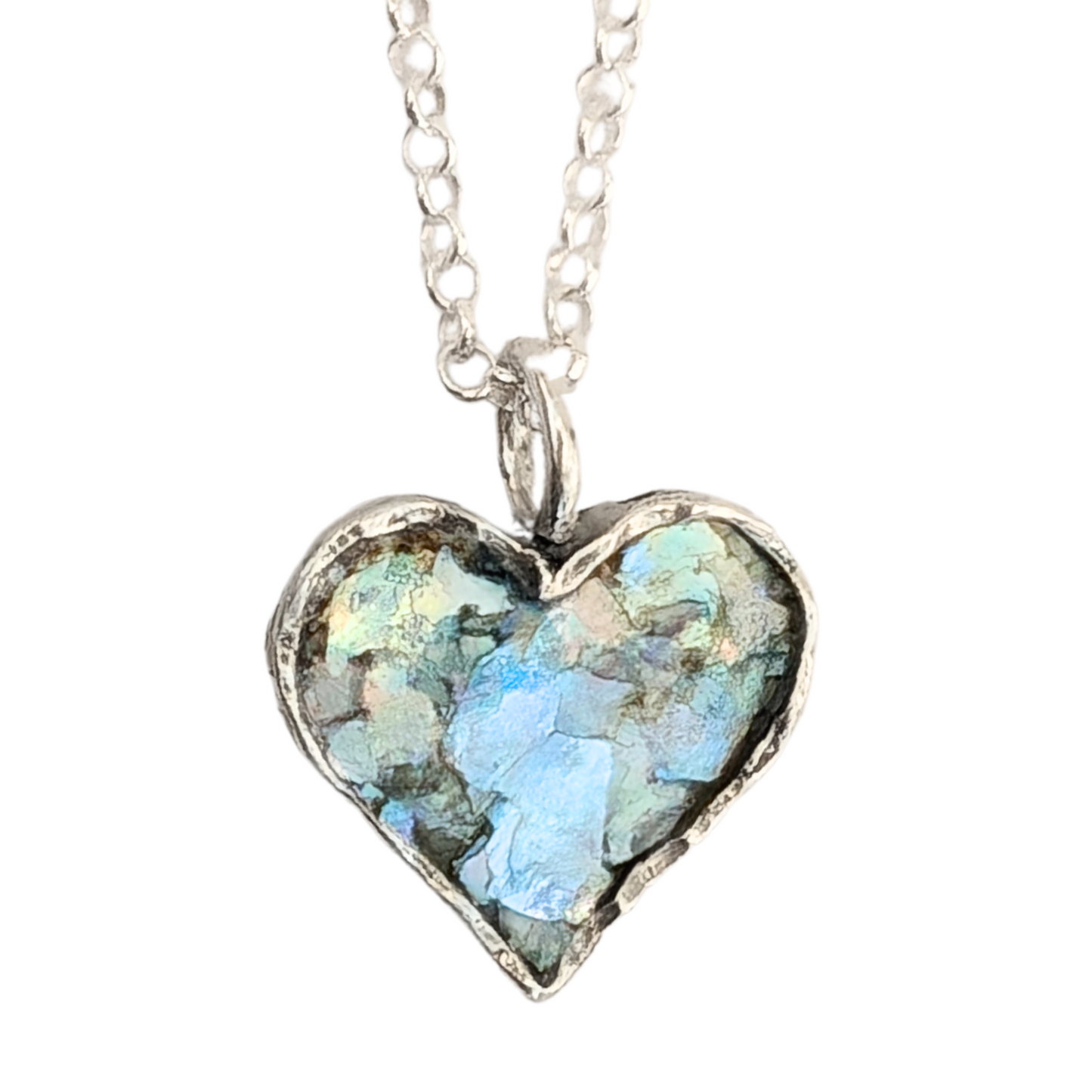 Authentic Roman Glass Heart Pendant in Sterling Silver, featuring a textured silver setting with a heart-shaped inlay of genuine Roman glass. Timeless, handcrafted jewelry, ready to ship for Christmas