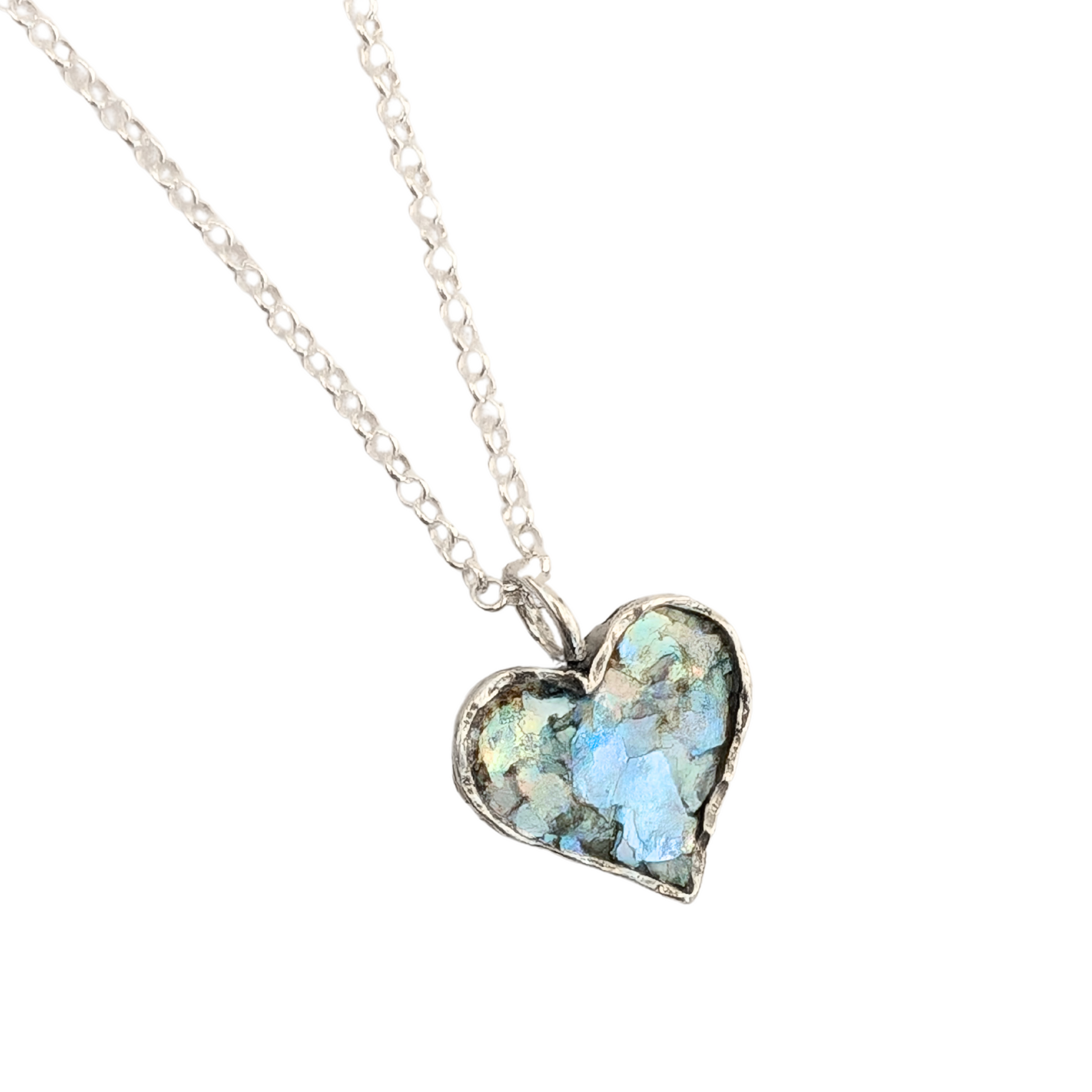 Authentic Roman Glass Heart Pendant in Sterling Silver, featuring a textured silver setting with a heart-shaped inlay of genuine Roman glass. Timeless, handcrafted jewelry, ready to ship for Christmas