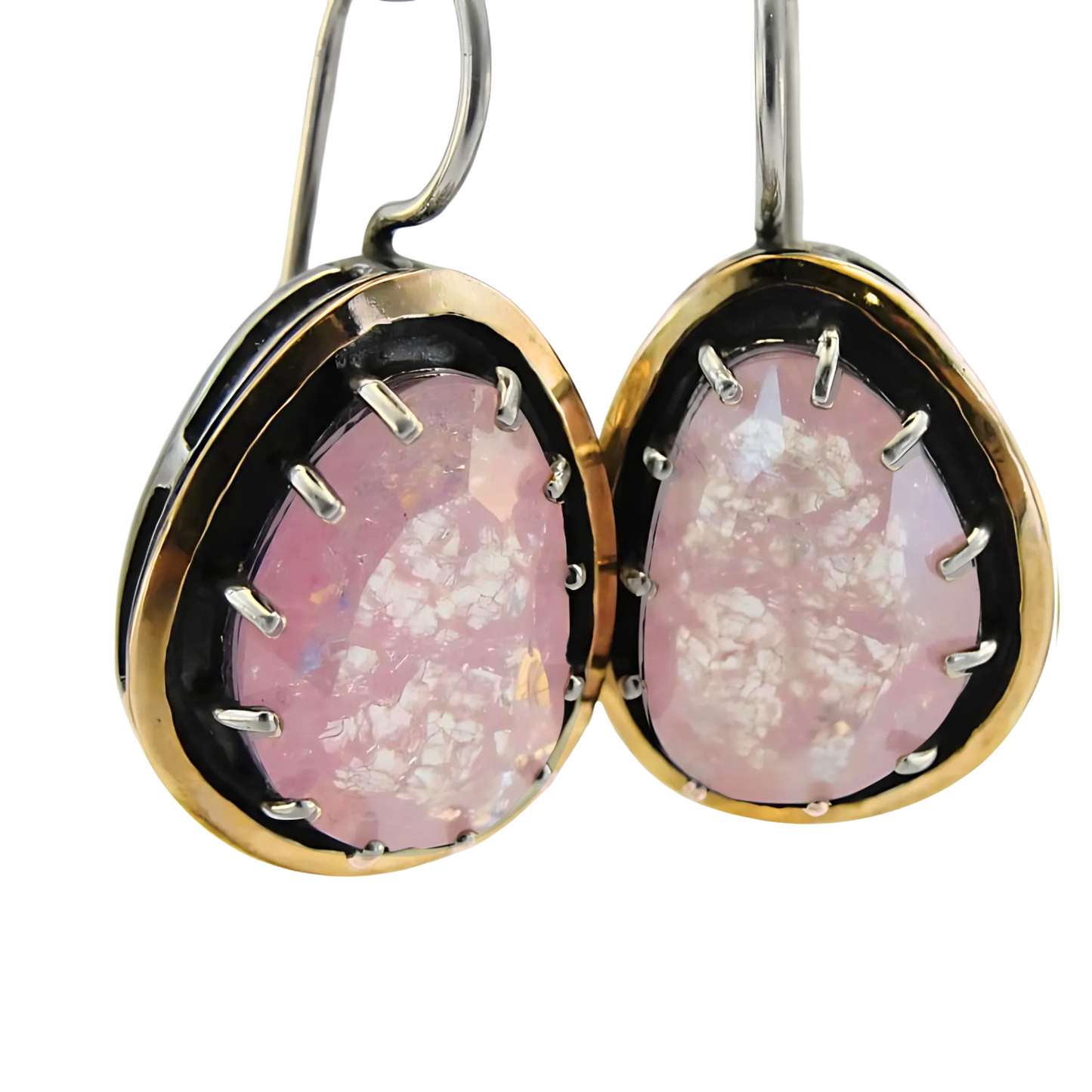 Elegant dangle earrings featuring large rose quartz gemstones, set in sterling silver with yellow gold accents. These unique earrings by Hadar Jewelry showcase a striking blend of color and sophistication, perfect for a statement look.