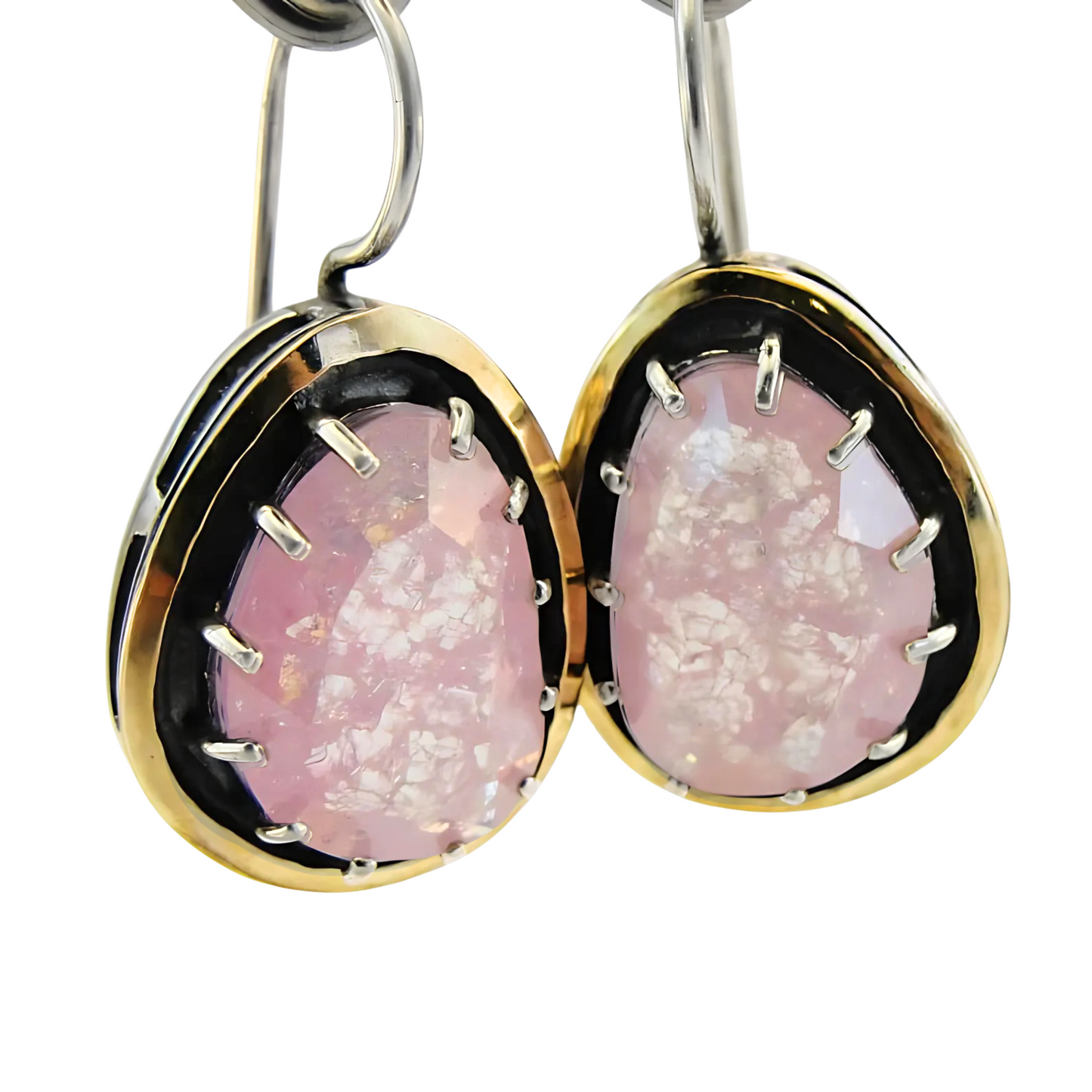 Elegant dangle earrings featuring large rose quartz gemstones, set in sterling silver with yellow gold accents. These unique earrings by Hadar Jewelry showcase a striking blend of color and sophistication, perfect for a statement look.