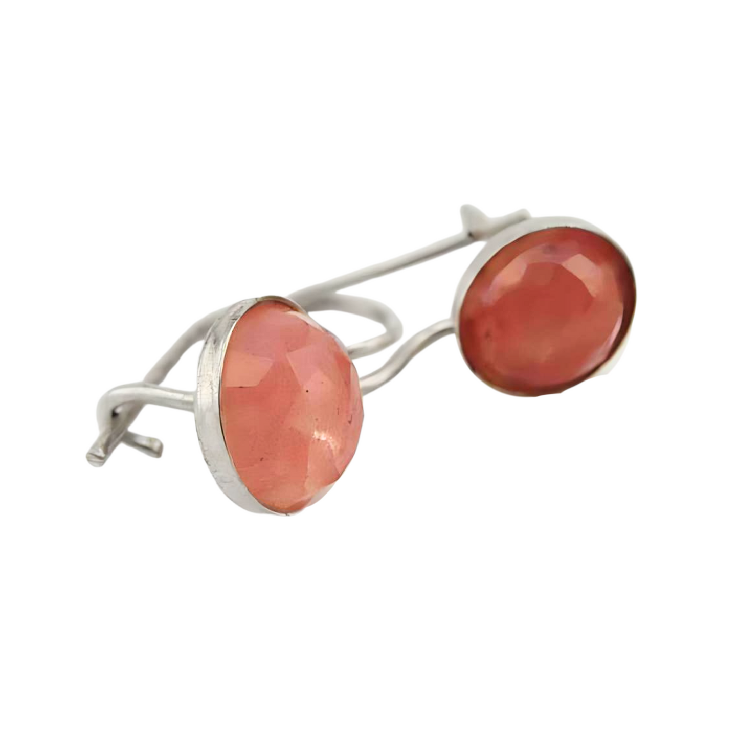 Sterling silver earrings featuring round 8mm rose quartz gemstones with a soft pink hue, set in a minimal yet elegant silver frame with secure hooks. The design highlights the natural beauty of the rose quartz stones, adding a refined touch to any outfit