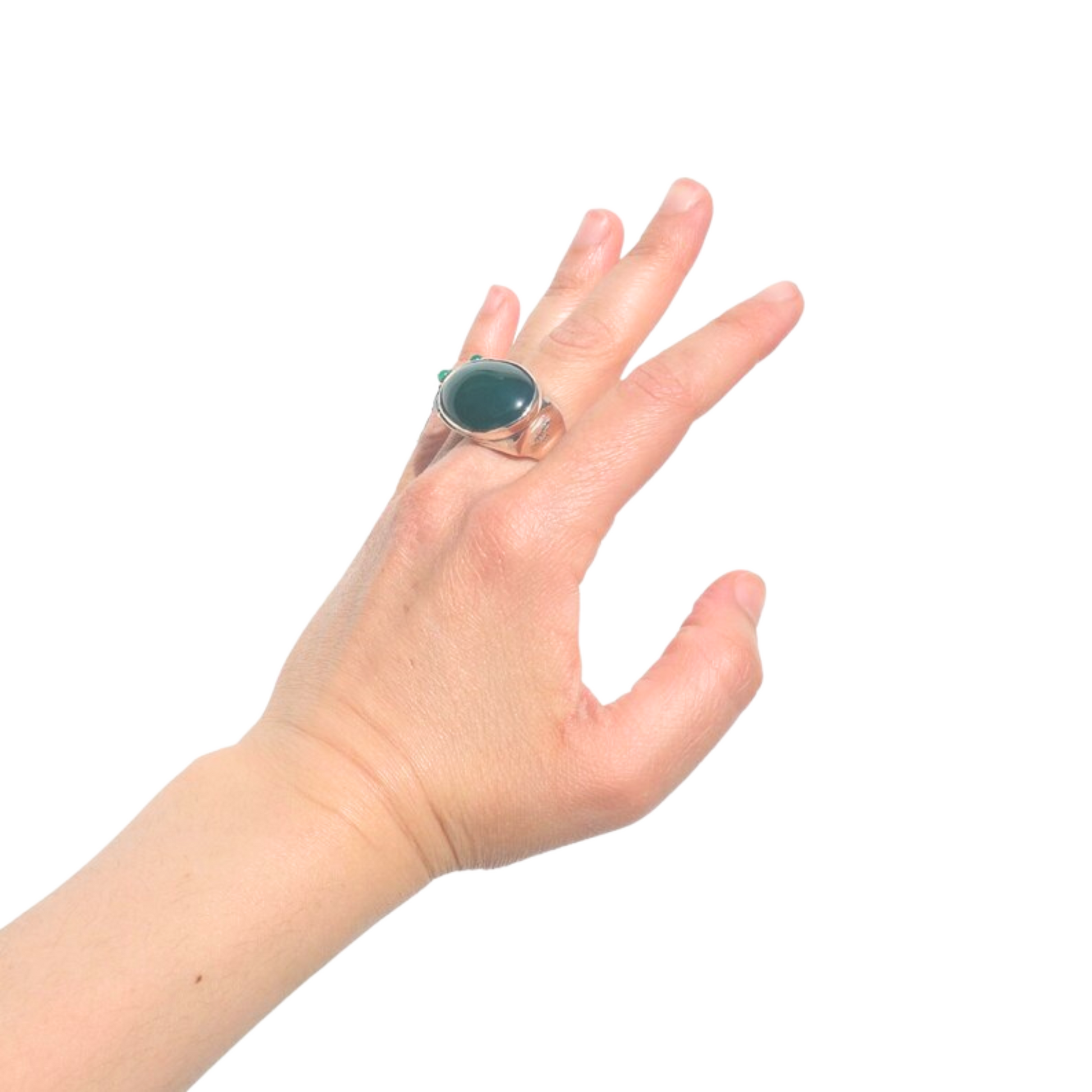 Sterling silver ring featuring a large natural green agate gemstone, set in a bold design. This unisex statement ring combines elegance and a touch of color, perfect for those who love unique, handcrafted jewelry.