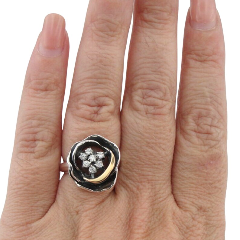 Rose-shaped Ring, Sterling Silver, Gold, and Zircon gemstones.