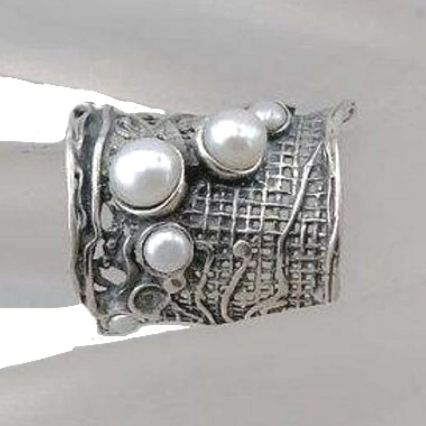 Sterling silver net texture wide ring with 5 natural white gemstones.