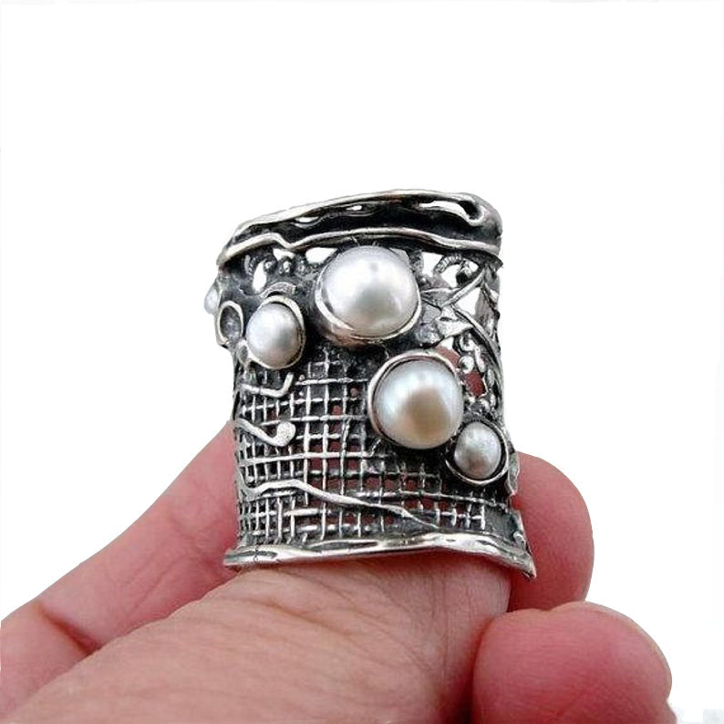 Sterling silver net texture wide ring with 5 natural white gemstones.