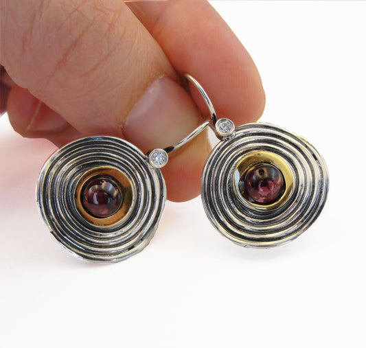 Round shape sterling silver dangle earrings with gold and natural red garnet and a dot of white Zircon