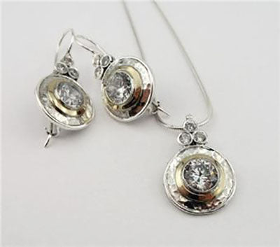 9k yellow gold and sterling silver earrings with sparkling white zircons.