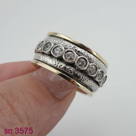 Two Silver Ring and in Center Studded Zircons Swivel Ring