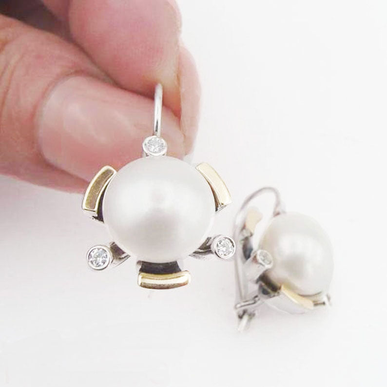 Round 10mm white Pearl inlaid in textured solid Sterling Silver and gold.